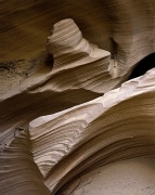 Sculpted by water, wind, and time, this sandstone is in the bottom of a slot canyon.  I walked on it, turned around, saw it and knew I needed to make this image.  Antelope Canyon, AZ.