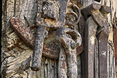 Just the tools of a rancher that have seen better days.  Rusted solid are the gun and pliers, now relegated to being hung on the side of a barn in Rockville, UT.